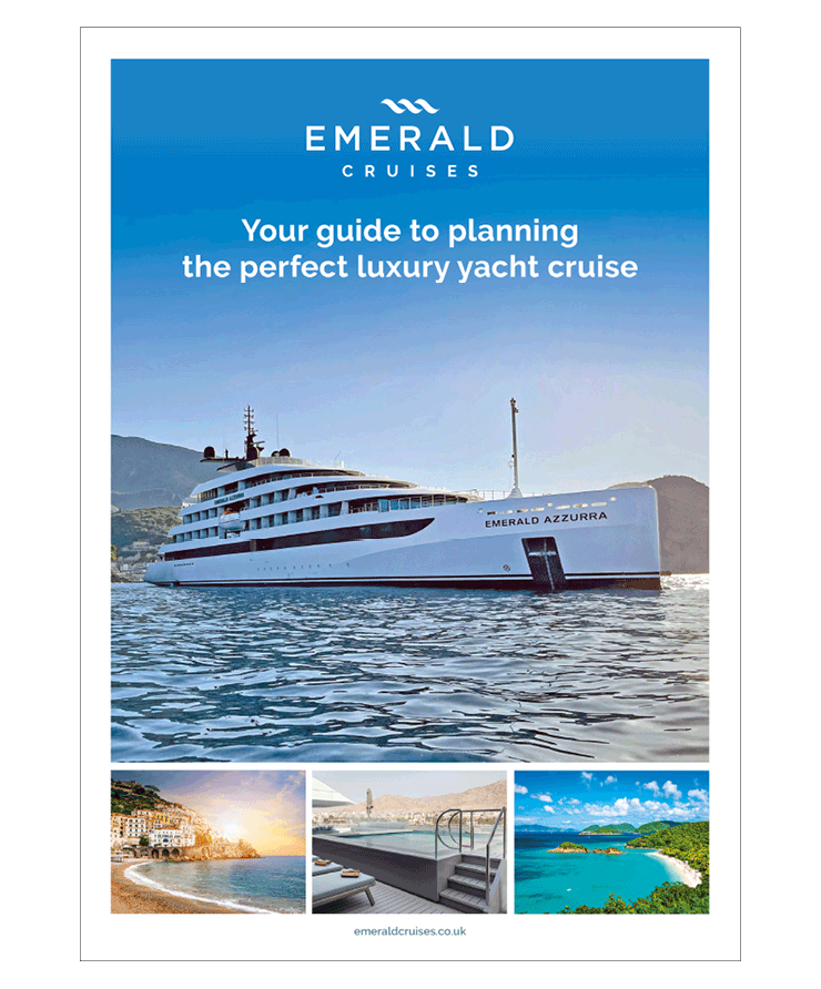 Brochure front cover, featuring a luxury yacht sailing clear blue waters on a bright sunny day