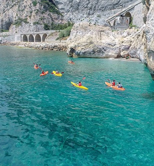 Emerald guests kayaking off the Amalfi Coastline
