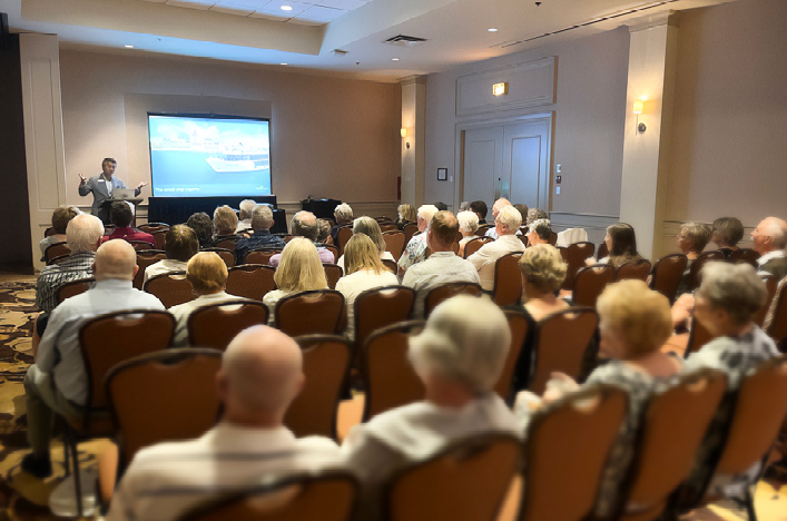 Juna giving presentation on one of our events