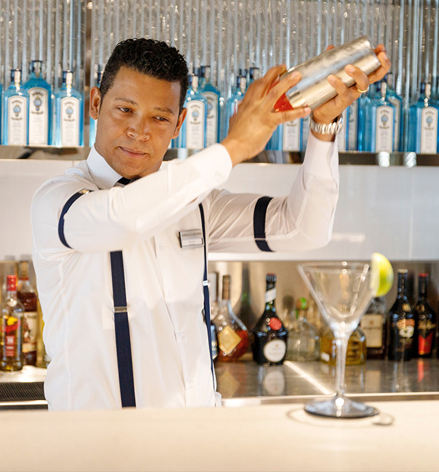 Bartender mixing cocktail