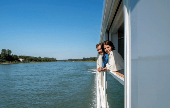 Two people are enjoying the view when they are on Emerald Cruises