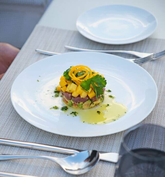 Gourmet dish served at an outdoor dining setting, Emerald Sakara