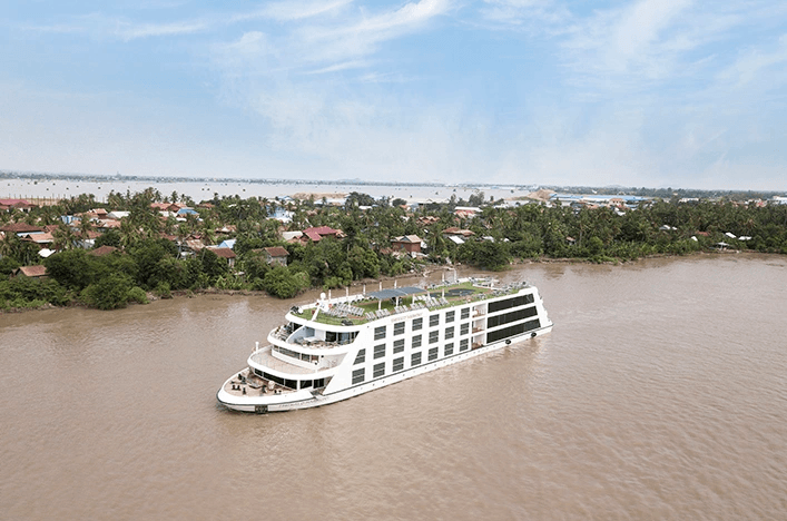 Luxury river ship sailing the Mekong River in Southeast Asia 