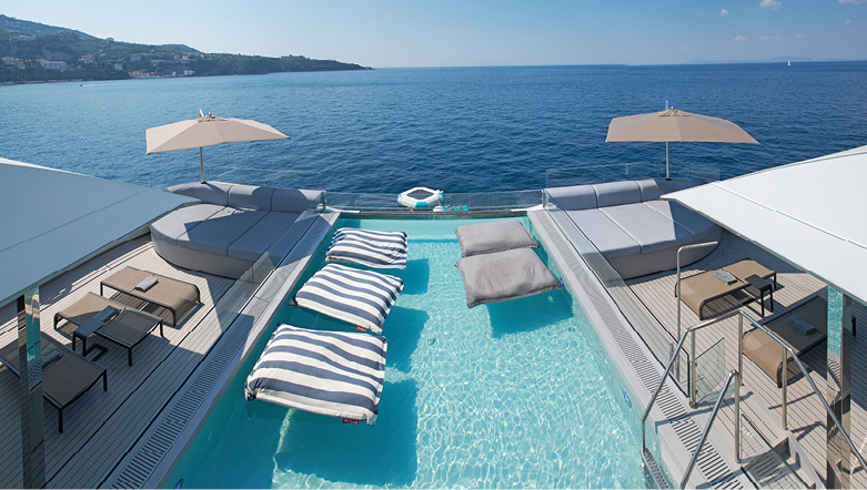 Outdoor infinity pool at the aft of a luxury yacht